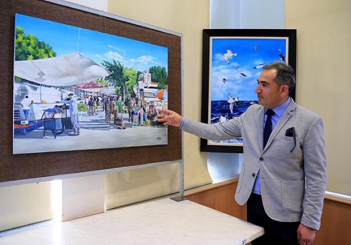 Milas-Bodrum Havalimanı’nda polis memuru olarak çalışan ressam İsmail Utku, 14